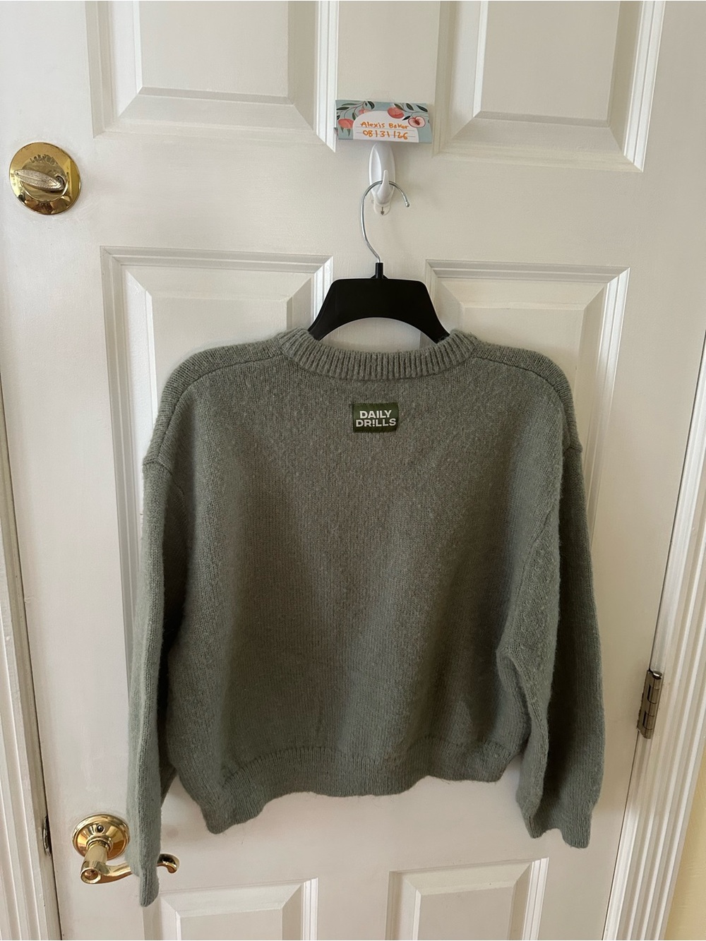 Daily Drills button up sweater in the color DD green, size xs/s